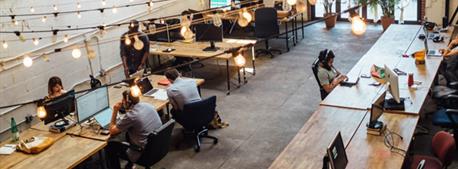open-workplace-with-hanging-lights